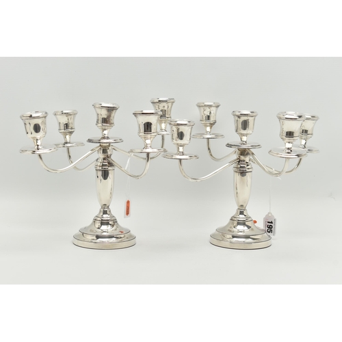 195 - A PAIR OF ELIZABETH II SILVER FIVE LIGHT CANDELABRAS, baluster stems, stepped circular loaded base, ... 