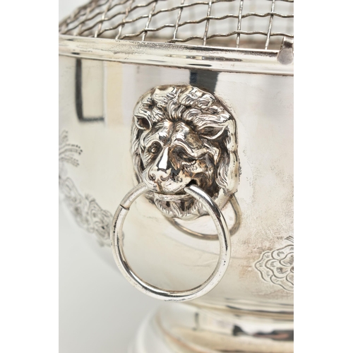 198 - AN ELIZABETH II SILVER ROSE BOWL, fitted with removable wire grille, two lion mask handles, the side... 