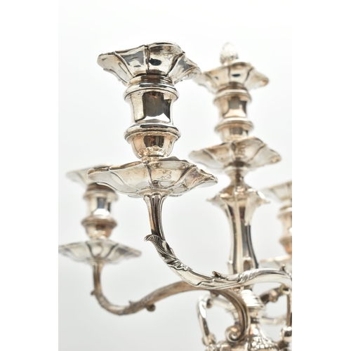 199 - A GEORGE V SILVER FIVE LIGHT CANDELABRUM IN GEORGE II STYLE, with removable shaped square drip pans,... 