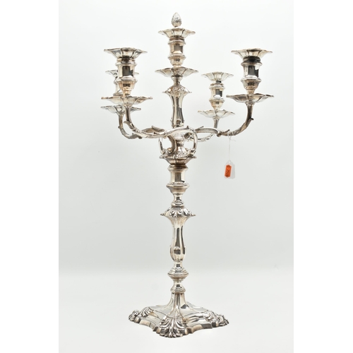 199 - A GEORGE V SILVER FIVE LIGHT CANDELABRUM IN GEORGE II STYLE, with removable shaped square drip pans,... 