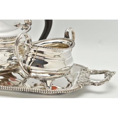 201 - A FOUR PIECE SILVER PLATED TEA SET WITH TRAY, comprising of a polished teapot, coffee pot, sugar bow... 