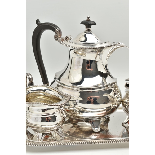 201 - A FOUR PIECE SILVER PLATED TEA SET WITH TRAY, comprising of a polished teapot, coffee pot, sugar bow... 