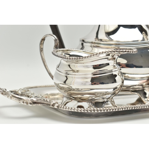 201 - A FOUR PIECE SILVER PLATED TEA SET WITH TRAY, comprising of a polished teapot, coffee pot, sugar bow... 