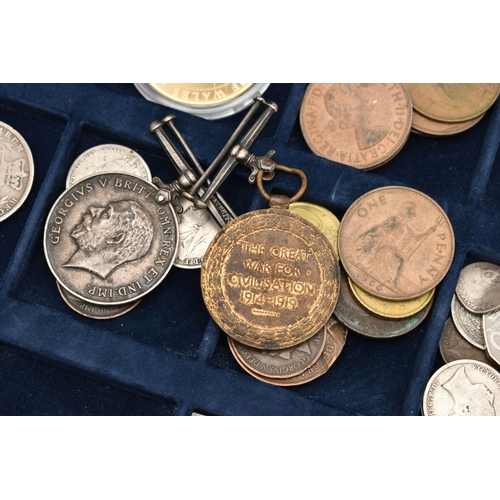 218 - AN ASSORTMENT OF CUTLERY AND COINS, to include a selection of white metal cutlery, two guernsey one ... 