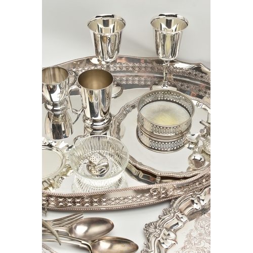 225 - ASSORTED WHITE METAL WARE, to include a silver plated on copper oval tray, a floral double handled t... 