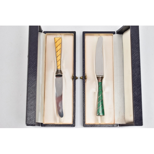 254 - TWO CASED 'RAADVAD' DANISH TEA KNIVES, with guilloche enamel detail, approximate length 116mm, both ... 