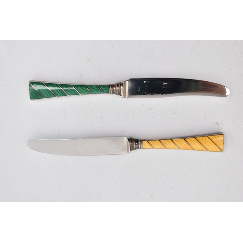 254 - TWO CASED 'RAADVAD' DANISH TEA KNIVES, with guilloche enamel detail, approximate length 116mm, both ... 