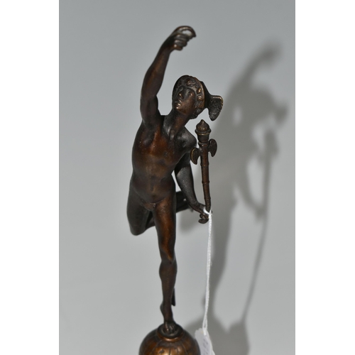 321 - A SMALL BRONZED FIGURE OF HERMES, standing on top of a globe, on a socle base, unsigned, height 31cm... 