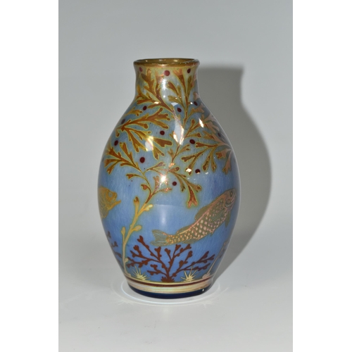 324 - A PILKINGTON'S BALUSTER VASE, decorated with fish and pond/seaweed on a blue ground, P and B mark to... 