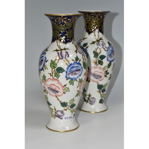 327 - A PAIR OF FREDERICK RHEAD FOR WOOD AND SONS VASES, the pate sur pate baluster shaped vases decorated... 