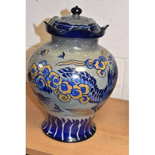 332 - TWO ROYAL CAULDON/CAULDON WARE COVERED JARS, decorated with dragons on blue-grey and beige patterned... 