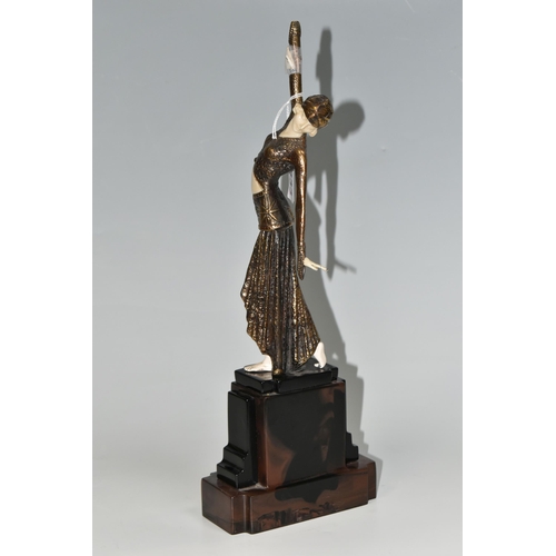 333 - AN ART DECO STYLE FIGURE, the female dancer surmounting a stepped geometric base, total height appro... 