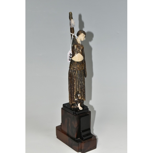 333 - AN ART DECO STYLE FIGURE, the female dancer surmounting a stepped geometric base, total height appro... 