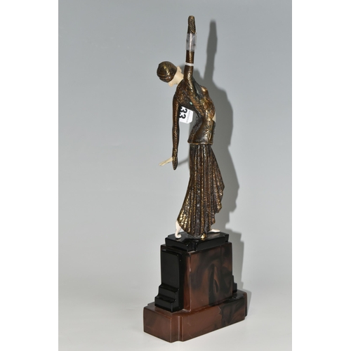 333 - AN ART DECO STYLE FIGURE, the female dancer surmounting a stepped geometric base, total height appro... 