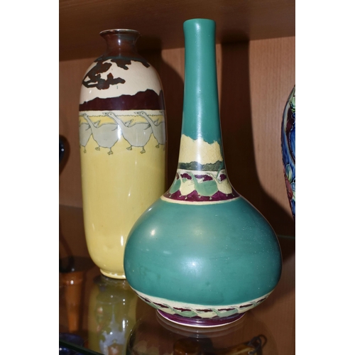 334 - A GROUP OF FOUR VASES, comprising a Thomas Forrester Trogon Ware vase tube lined with an exotic bird... 