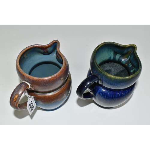 336 - TWO BOURNE DENBY OWL JUGS, 1920s-1930s Danesby Ware, one with mid blue and brown glaze, the other da... 