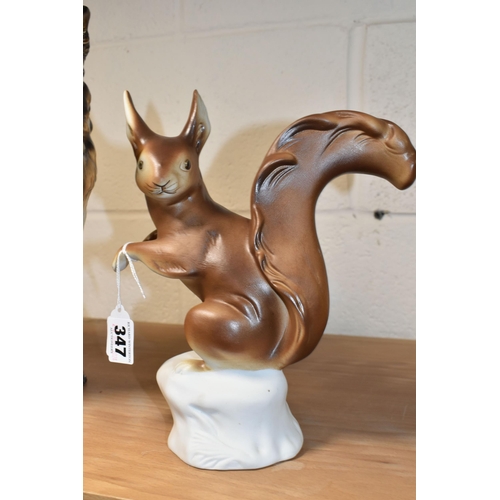 347 - A ROYAL DUX PORCELAIN RED SQUIRREL, matt glaze, applied pink Royal Dux plaque to the base, printed a... 