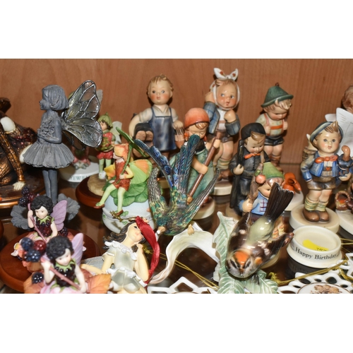 357 - A COLLECTION OF WEST GERMAN GOEBEL FIGURES AND FLOWER FAIRY ORNAMENTS, comprising a small plaque Hum... 