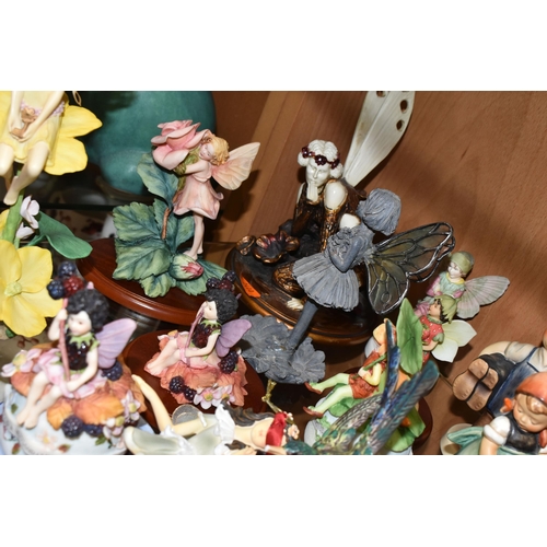 357 - A COLLECTION OF WEST GERMAN GOEBEL FIGURES AND FLOWER FAIRY ORNAMENTS, comprising a small plaque Hum... 