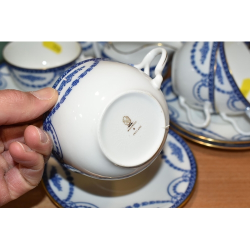 358 - A GROUP OF WEDGWOOD TEAWARE, a Wedgwood tea set decorated with blue floral swags, gilt edged on a wh... 