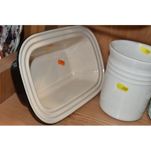 359 - THREE PIECES OF LE CREUSET KITCHENWARE, comprising a black Le Creuset oven dish 13-28, a cream utens... 