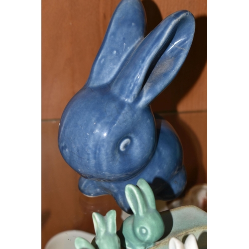 364 - A GROUP OF BOURNE DENBY RABBITS, comprising a very large Marmaduke green  snub nose rabbit (badly da... 