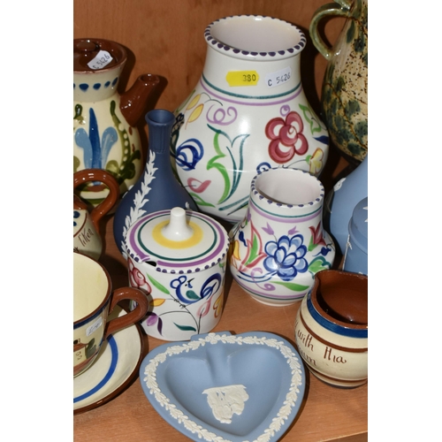 380 - A COLLECTION OF NAMED CERAMICS, comprising two Art Pottery chamber sticks, six pieces of Wedgwood bl... 