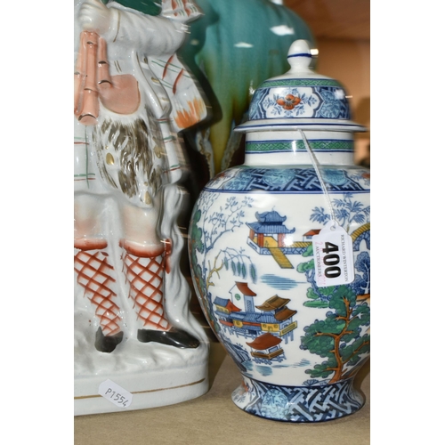 400 - A GROUP OF LARGE ORNAMENTS, comprising a Staffordshire Highlander porcelain figure, height 41 cm, a ... 