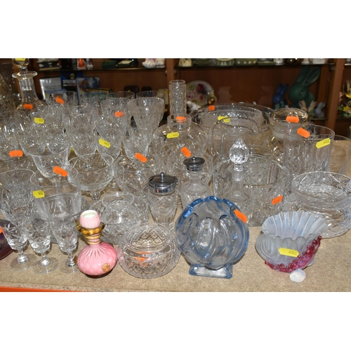 402 - A LARGE SELECTION OF GLASSWARE INCLUDING A WATERFORD CRYSTAL CLOCK, TOGETHER WITH A VARIETY OF THOMA... 