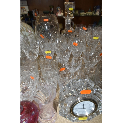 402 - A LARGE SELECTION OF GLASSWARE INCLUDING A WATERFORD CRYSTAL CLOCK, TOGETHER WITH A VARIETY OF THOMA... 