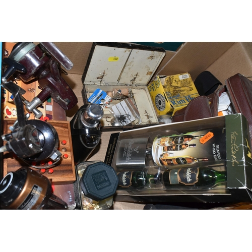 406 - SIX BOXES AND LOOSE SUNDRIES including 'Shakespeare' fishing reels and assorted supplies in a vintag... 