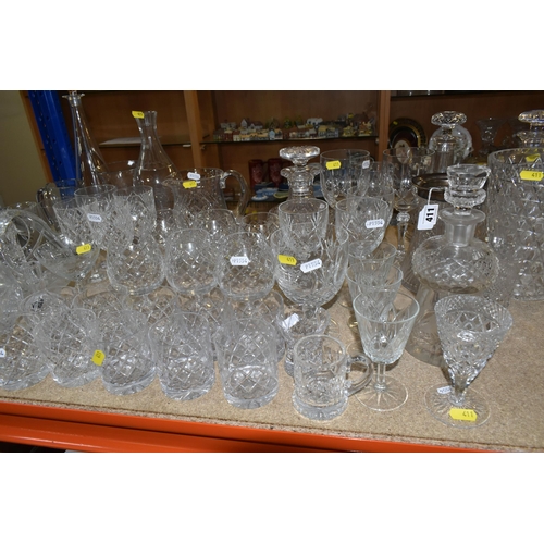 411 - A LARGE VARIETY OF CRYSTAL CUT DECANTERS, GLASSES, ETC, including two 'Royal Brierley' vases and a d... 