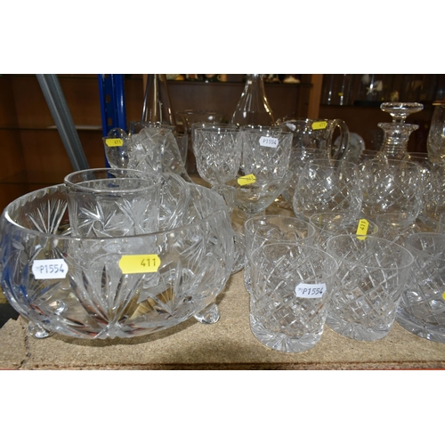 411 - A LARGE VARIETY OF CRYSTAL CUT DECANTERS, GLASSES, ETC, including two 'Royal Brierley' vases and a d... 