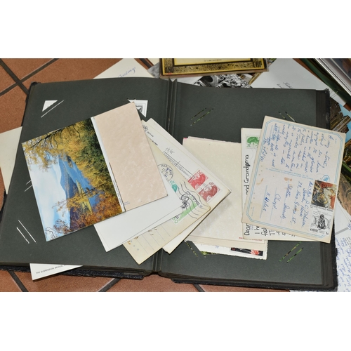 416 - TWO BOXES AND LOOSE EPHEMERA AND WALKING STICKS, including a large collection of vintage postcards (... 