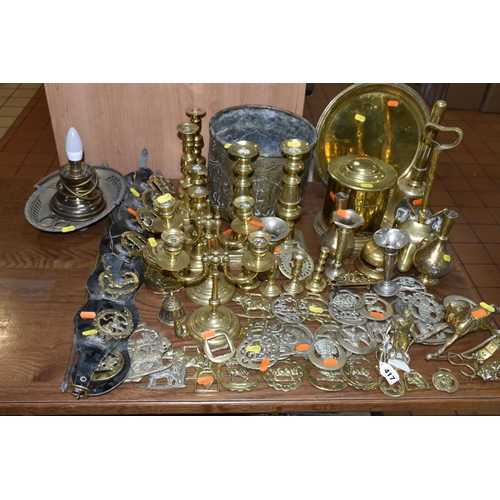 417 - A LARGE COLLECTION OF BRASSWARE INCLUDING SERVING TRAYS with Indo-Persian motifs, a large range of h... 