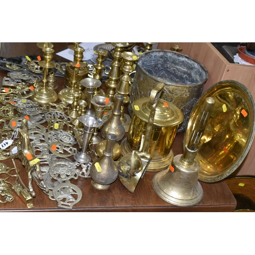 417 - A LARGE COLLECTION OF BRASSWARE INCLUDING SERVING TRAYS with Indo-Persian motifs, a large range of h... 