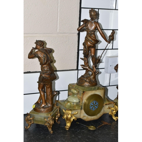 423 - A FRENCH CLOCK GARNITURE 'PAR FERRAND' in green onyx with spelter figures 'Chasse aux Papillons' wit... 