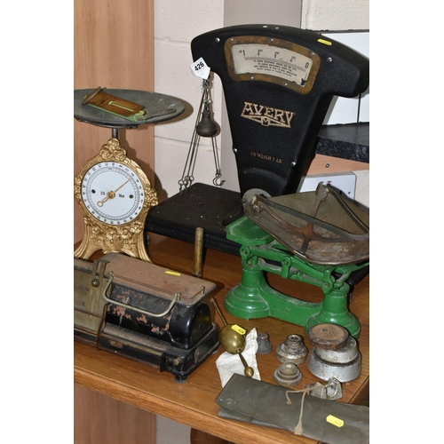 426 - A COLLECTION OF SCALES, MEASURING EQUIPMENT, WEIGHTS, ETC, to include a large Avery Tobacco Scale, a... 