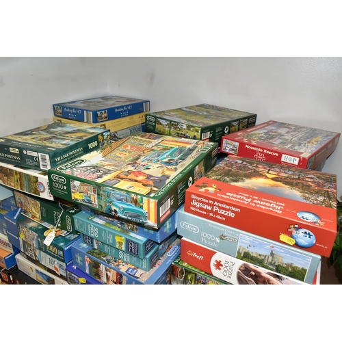 452 - A COLLECTION OF MODERN BOXED JIGSAWS, to include examples by Ravensburger, Jumbo (including Wasgij),... 