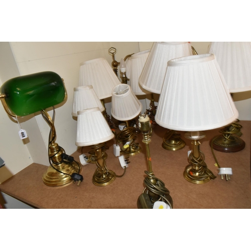 468 - A QUANTITY OF ASSORTED BRASS TABLE AND DESK LAMPS, majority are have various candlestick type bases,... 