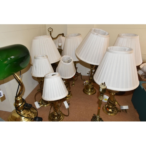 468 - A QUANTITY OF ASSORTED BRASS TABLE AND DESK LAMPS, majority are have various candlestick type bases,... 