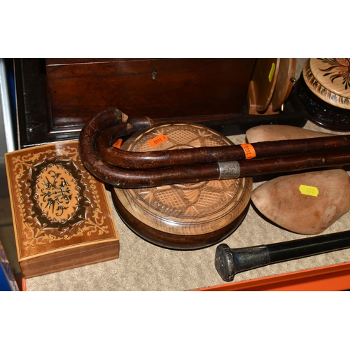 479 - A GROUP OF TREEN, to include a silver topped cane, hallmarked London 1928, a walking stick with worn... 