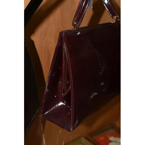 422 - THREE LADIES' VINTAGE HANDBAGS, comprising a brown French faux Croc bag, a claret patent leather col... 