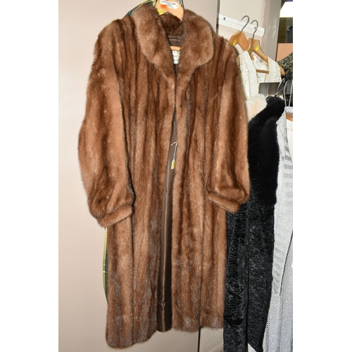 430 - A GROUP OF LADIES VINTAGE CLOTHING, comprising a full length caramel coloured mink coat by Faulkes o... 