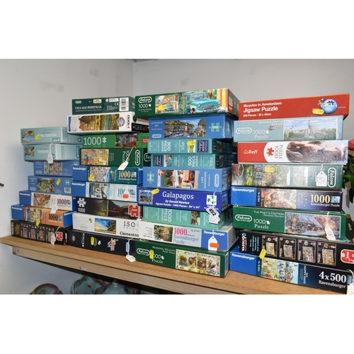 452 - A COLLECTION OF MODERN BOXED JIGSAWS, to include examples by Ravensburger, Jumbo (including Wasgij),... 