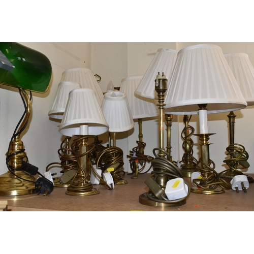 468 - A QUANTITY OF ASSORTED BRASS TABLE AND DESK LAMPS, majority are have various candlestick type bases,... 