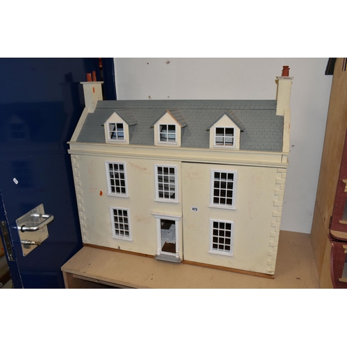 473 - A LARGE MODERN WOODEN DOLLS HOUSE, modelled as a Georgian townhouse, front opening to reveal four ro... 