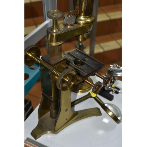 498 - A LARGE BRASS VICTORIAN MICROSCOPE AND OTHER OPTICAL EQUIPMENT, a large double eyepiece microscope i... 