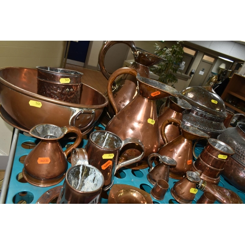 501 - A VARIETY OF COPPERWARE, comprising a selection of measuring vessels, tankards, an 'arts and crafts'... 