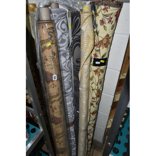 503 - ELEVEN ROLLS OF ASSORTED UPHOLSTERY AND CURTAIN FABRIC, mostly floral designs (s.d) (11 rolls)